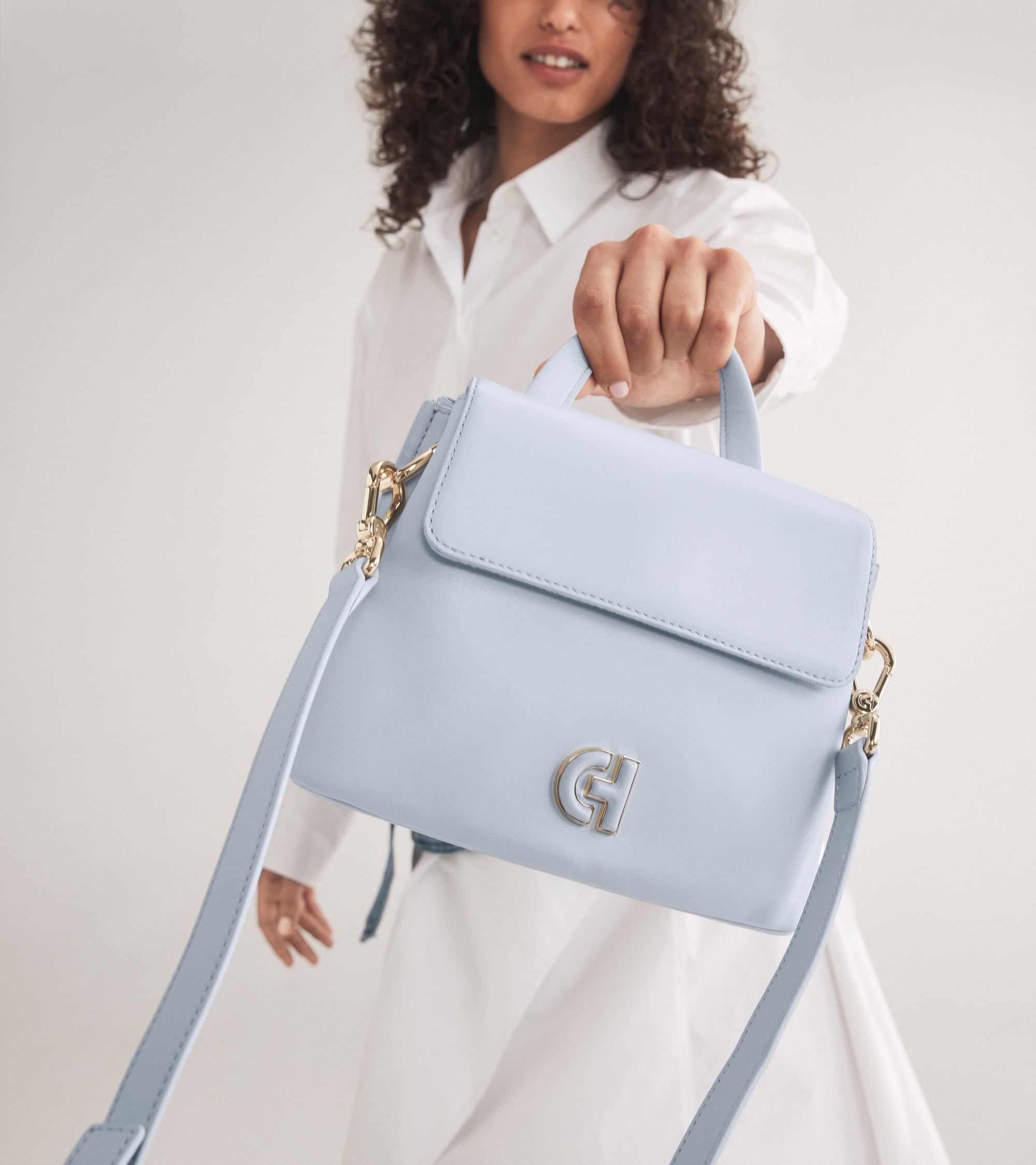 Female model with a handbag